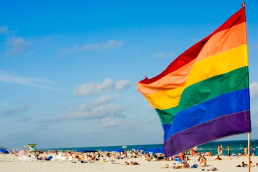 Close-up of a flag fluttering on the beach